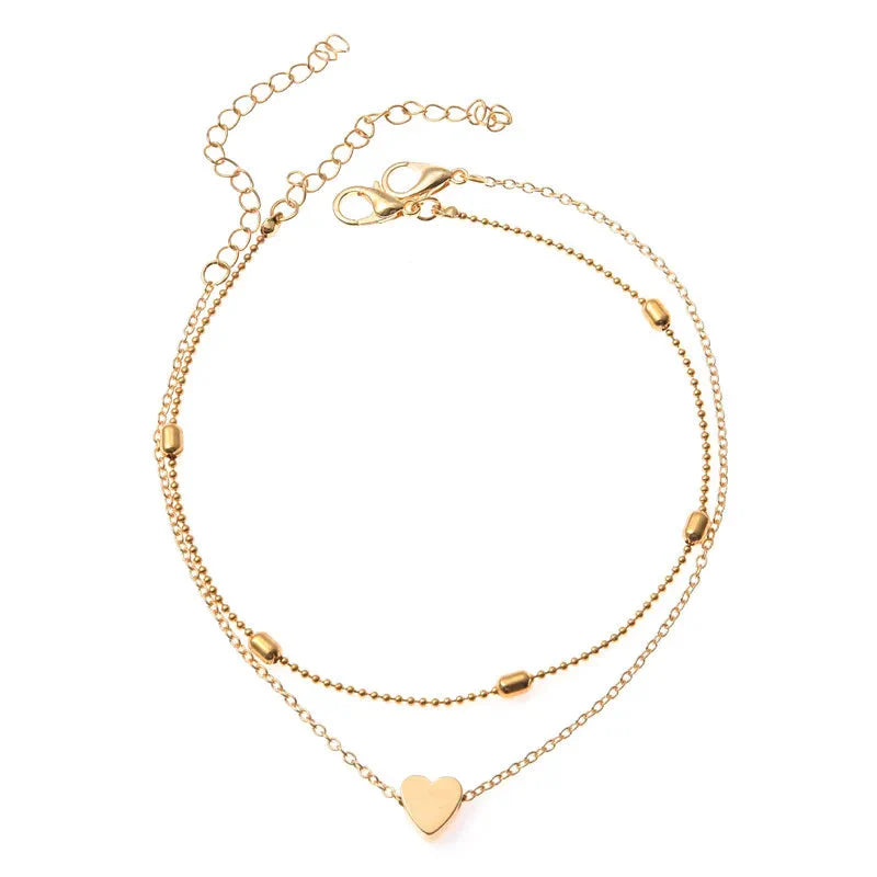 Bracelet de cheville tendance pour femme, style bohème vintage, multicouche avec perles et cœur