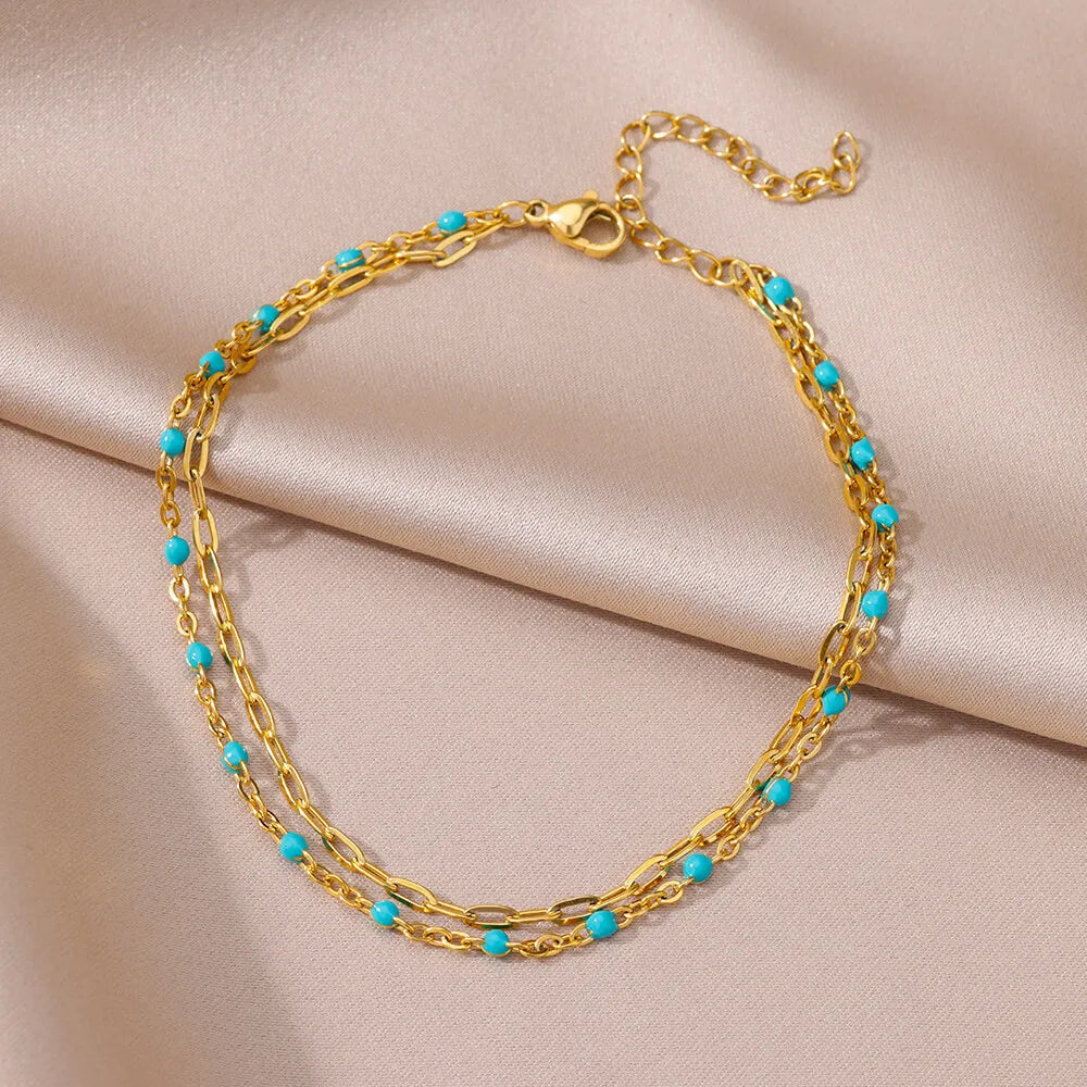Bracelet de cheville pour femme – Accessoire d'été pour la plage – Chaîne en acier inoxydable avec perles d'imitation