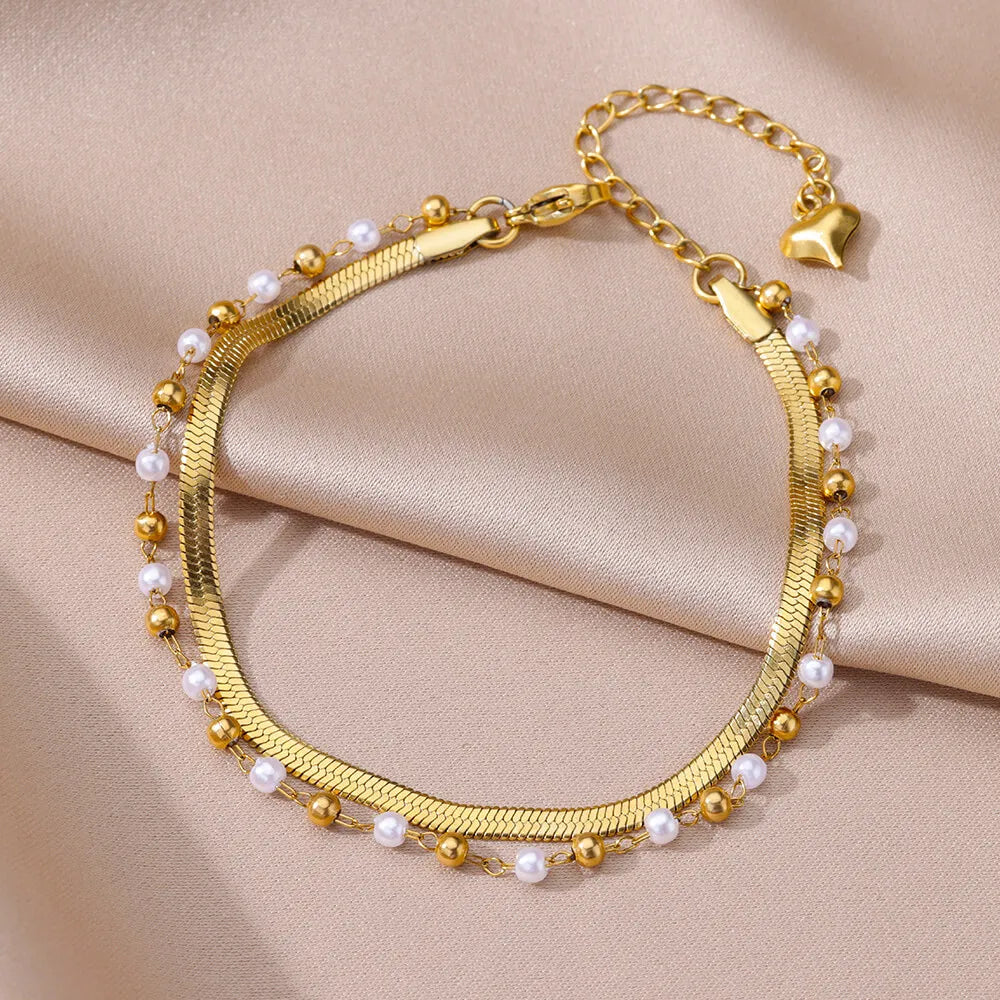 Bracelet de cheville pour femme – Accessoire d'été pour la plage – Chaîne en acier inoxydable avec perles d'imitation
