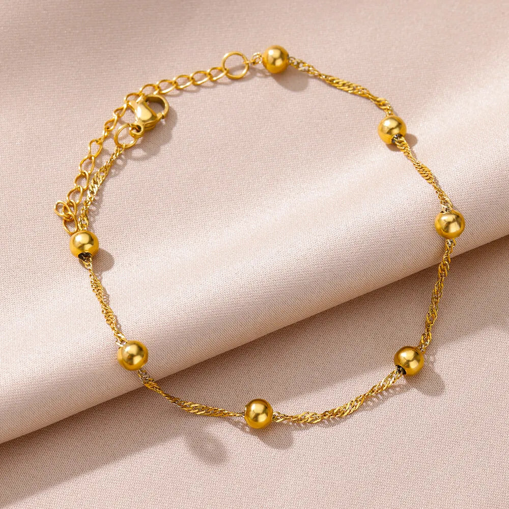 Bracelet de cheville pour femme – Accessoire d'été pour la plage – Chaîne en acier inoxydable avec perles d'imitation